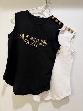 Two Black & White With Gold Logo tops, Sz Small